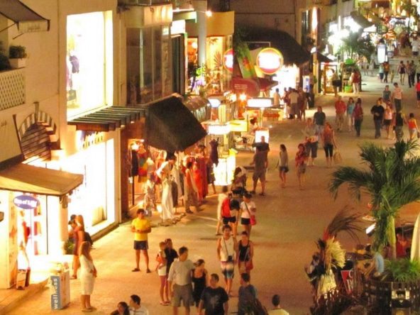 Photo of restaurants and people on 5th avenue Playa Del Carmen at night